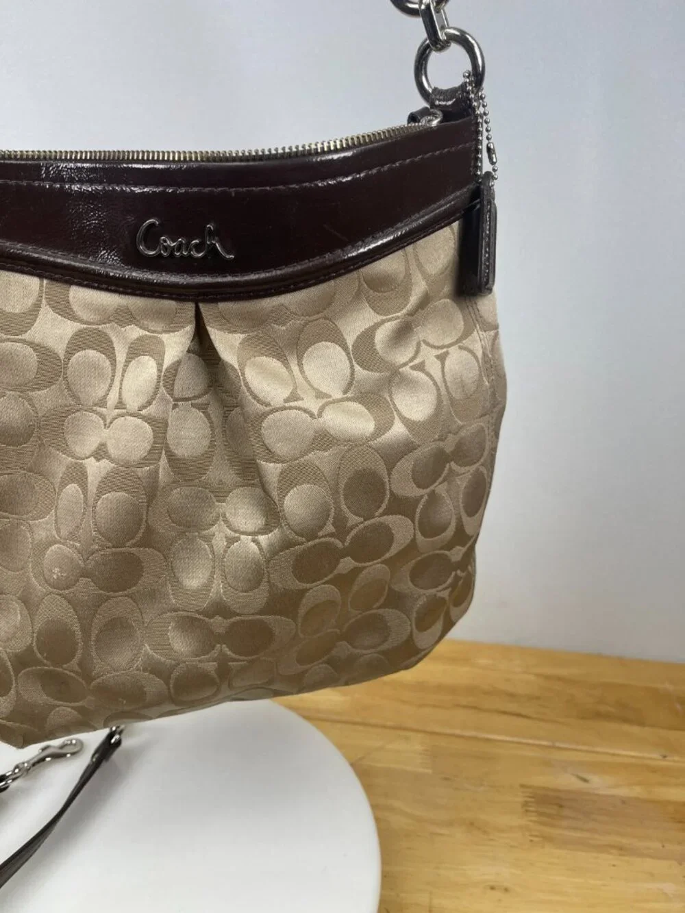 Classic older-era Coach Signature hobo bag featuring jacquard canvas and patent
